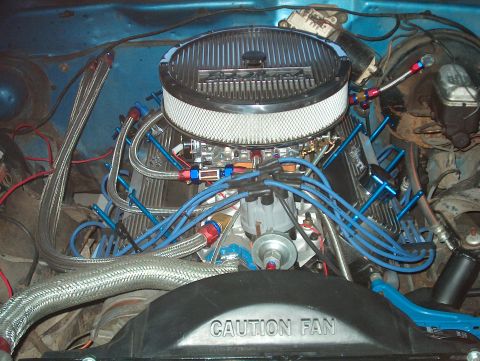 1978 Ford Ranchero - Close-up view of a modified engine bay, showing various aftermarket components and wiring.