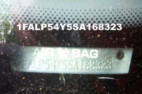 1995 Ford Taurus - VIN plate and "AIR BAG" label are visible on the vehicle's interior.