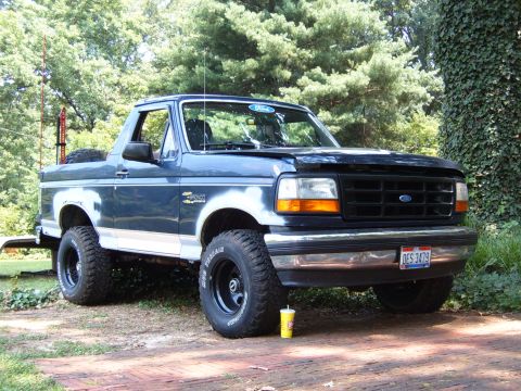 1993 Ford Bronco - This 1993 Ford Bronco is parked outside on a sunny day.