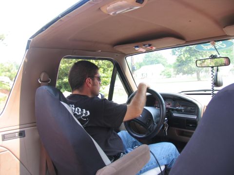 1993 Ford Bronco - Driver's perspective inside a 1993 Ford Bronco, showing the dashboard and steering wheel.