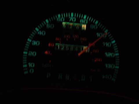 1993 Ford Taurus - Not a damn thing on the road but me and the bugs!! And that cop hiding behind the sign. >:O