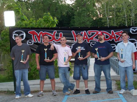 1995 Ford Probe - Winners pose with their trophies at a Mazda event.