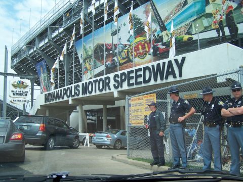 1995 Ford Probe - Police officers stand guard at the entrance to the Indianapolis Motor Speedway.