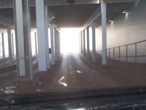 1995 Ford Probe - View from inside a concrete tunnel looking towards bright light.