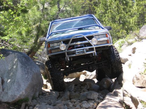 1994 Ford Bronco - This modified SUV navigates a difficult rocky terrain, its off-road capabilities.