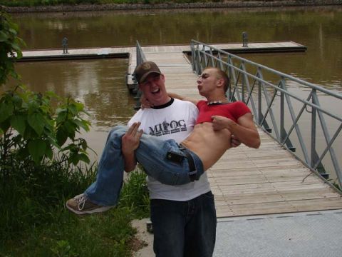 1995 Ford Probe - Two friends goofing around on a dock near the water.