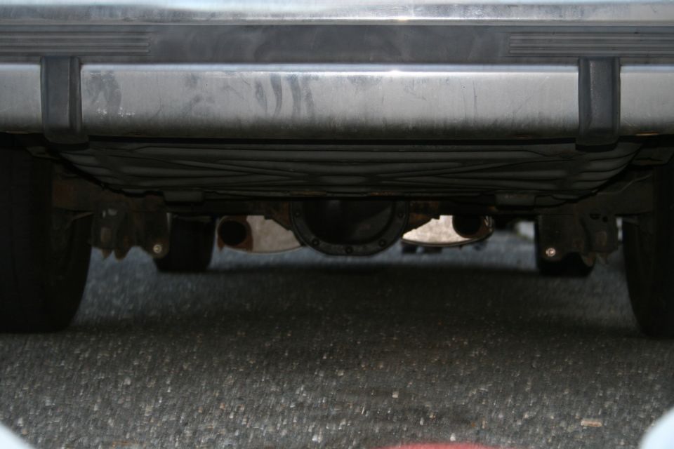 Rear differential and exhaust system of a car
