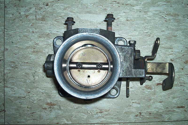 Throttle body before