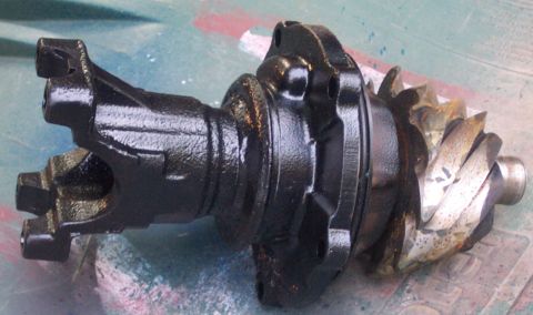 1978 Ford Bronco - Differential and driveshaft yoke assembly, likely for a 4x4 vehicle.
