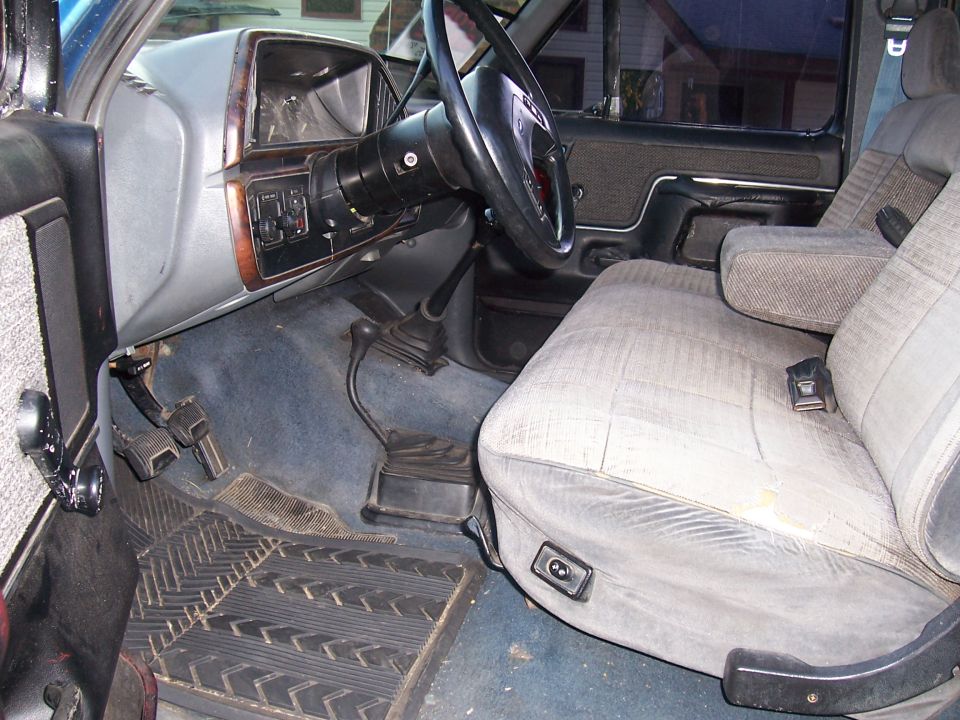 1988 Ford Pickup interior showing dashboard, steering wheel, and seats