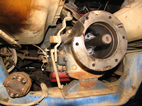 1978 Ford Bronco - Underside view of a vehicle's transmission and driveshaft assembly, likely during maintenance.