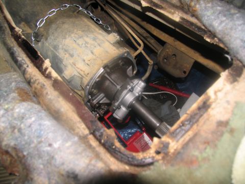 1978 Ford Bronco - This image shows the interior drivetrain components of a vehicle, likely during a repair or removal process.