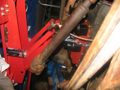 1978 Ford Bronco - Close-up view of vehicle drivetrain components, including a driveshaft and transmission housing.