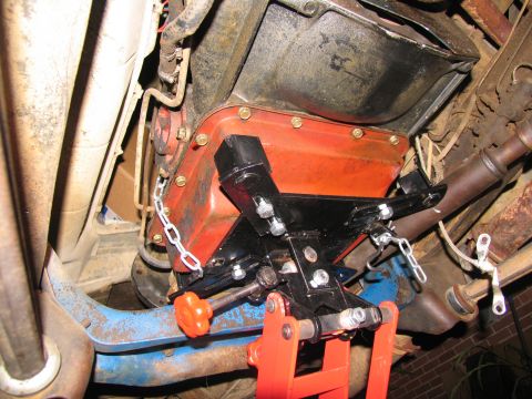 1978 Ford Bronco - A transmission jack is used to support the engine or transmission during removal.