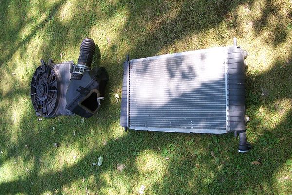 Radiator and air intake assembly on grass