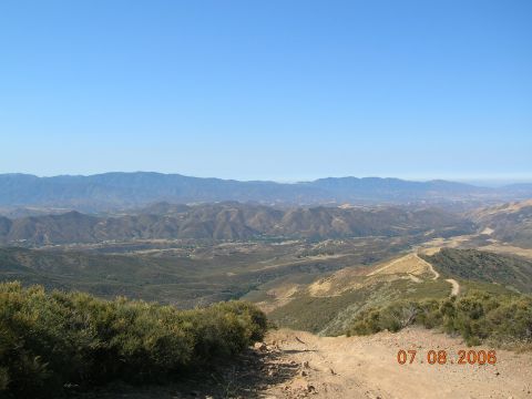 1985 Ford Bronco - A scenic view of a mountainous terrain with a winding dirt path, captured on July 8, 2006.