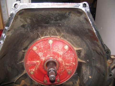 1978 Ford Bronco - Close-up of a transmission bell housing, showing the torque converter and splined shaft.