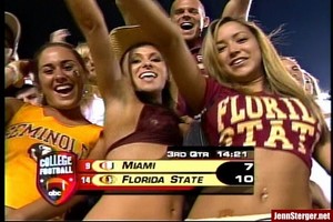 1986 Ford Bronco - Fans cheer during a college football game between Miami and Florida State, with the scoreboard visible.