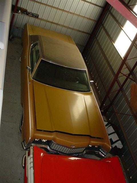 1972 Ford Ranchero - 1972 Ford Ranchero seen from above in a garage, with a red vehicle partially visible in front.