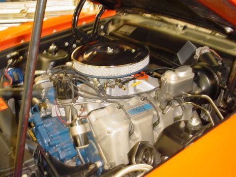 1972 Ford Ranchero - Close-up view of a V8 engine, showing the air cleaner, distributor, and brake booster assembly.