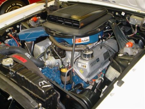 1972 Ford Ranchero - Close-up of a Ford Boss 302 engine, its distinctive valve covers and air intake system.