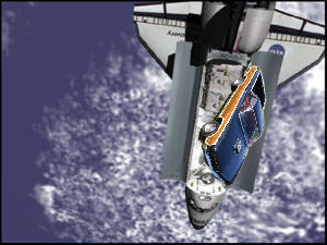 2002 Ford Crown Victoria - A car is shown attached to the Space Shuttle Discovery, with a SuperMotors logo visible.