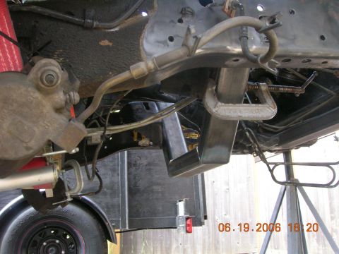 1996 Ford Bronco - A close-up view of a vehicle's undercarriage shows frame modification work in progress.