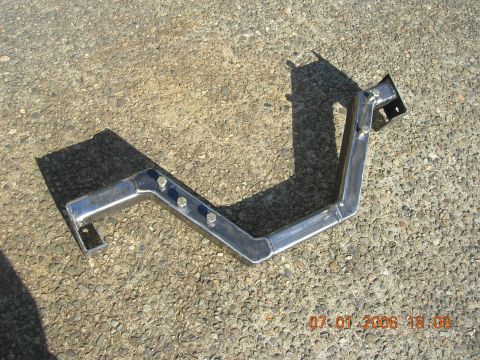 1996 Ford Bronco - A custom metal bracket is shown on a gravel surface, with a timestamp in the corner.