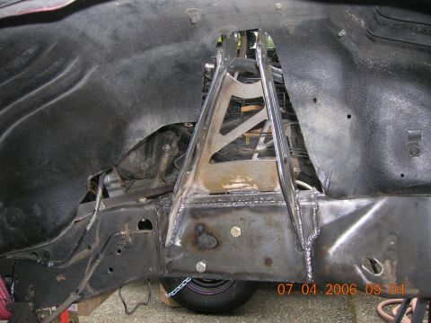 1996 Ford Bronco - Close-up of a custom suspension modification, with a date stamp of 07.04.2006 visible.