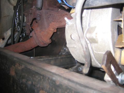 1982 Ford Bronco - This photo shows a close-up view of an engine's exhaust manifold and associated components.