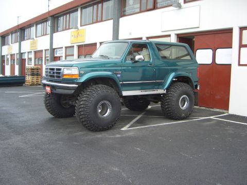 1996 Ford Bronco - This lifted 1996 Ford Bronco features enormous tires, giving it a commanding presence.
