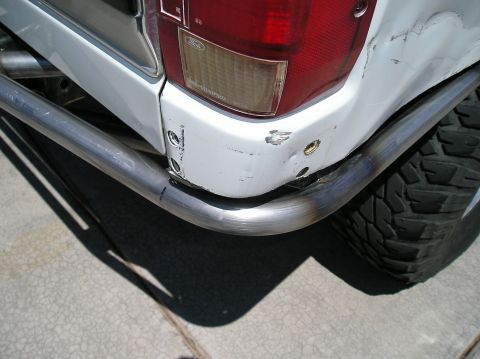 1993 Ford Bronco - Custom rear bumper installed on a vehicle, showing the corner and taillight assembly.