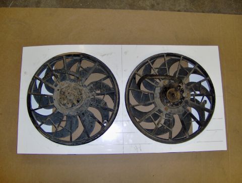 1978 Ford Bronco - Two electric cooling fans are shown, each with a central hub and multiple blades.
