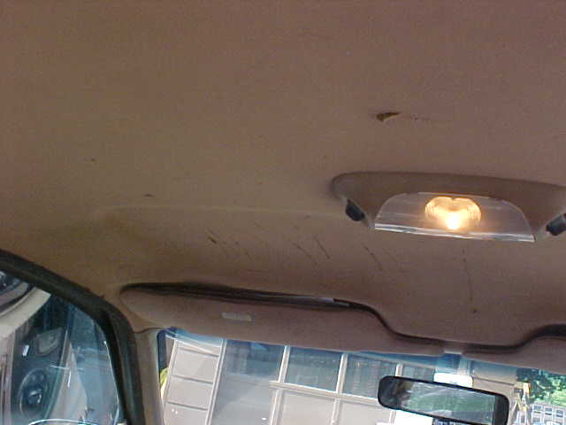 Headliner over driver seat