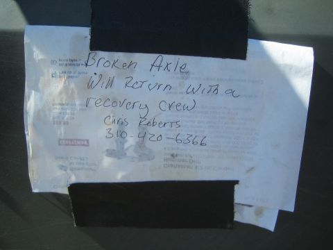1990 Ford Bronco - photo of a handwritten note left on a vehicle, not a technical document.