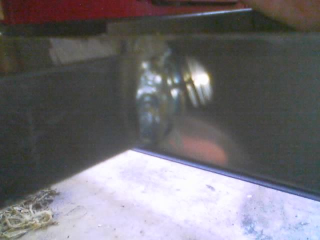 Close-up of welding on a dark metal surface