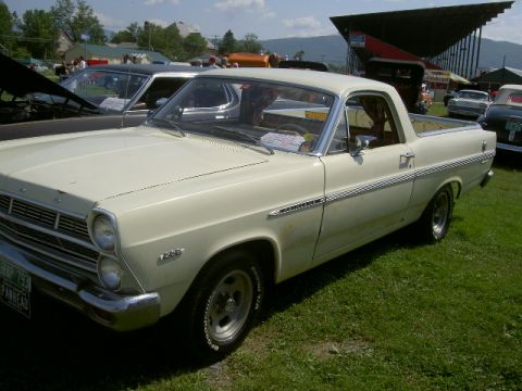 1967 Ford Ranchero - Cream-colored 1967 Ford Ranchero on display at an outdoor event.