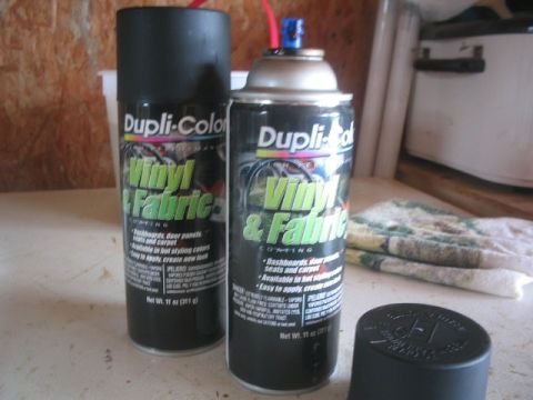 1994 Ford Probe - Dupli-Color spray cans for vinyl and fabric coatings are shown on a surface.