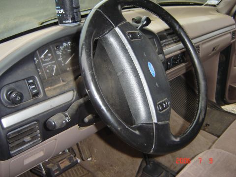 1993 Ford Bronco - Interior view of a Ford truck's dashboard, showing the steering wheel and instrument cluster.