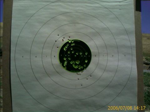 1990 Ford Bronco - A target displays the results of shooting practice, with many bullet impacts visible on its surface.