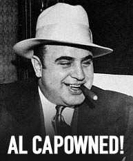 1977 Ford Mustang II - Al Capone, notorious gangster, pictured with a cigar and a fedora hat.