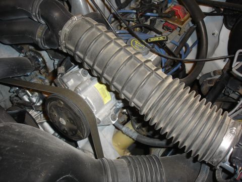 1996 Ford Bronco - Old pump and bracket.