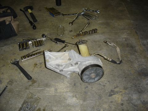 1996 Ford Bronco - Old pump and bracket out.