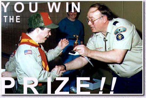 1977 Ford Mustang II - A scout is awarded a trophy, with text celebrating their win.