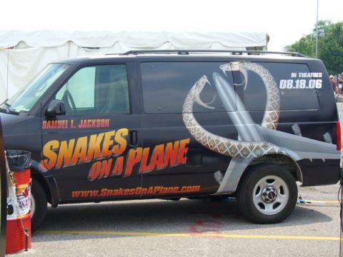 1995 Ford Taurus - This van is decorated with promotional art for the movie "Snakes on a Plane", including the release date 08.18.06.