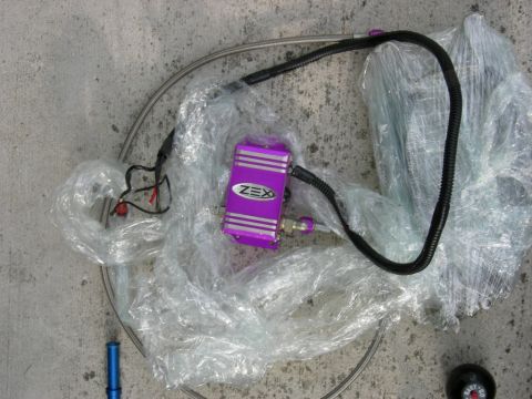 1996 Ford Probe - This photo shows a ZEX nitrous oxide system part, not a 1996 Ford Probe.