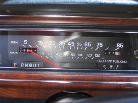 1988 Ford Crown Victoria LTD - The dashboard displays the vehicle's speed, mileage, and fuel level.