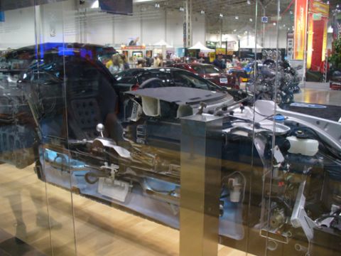 1995 Ford Taurus - A cutaway display reveals the internal structure and mechanical components of a car.