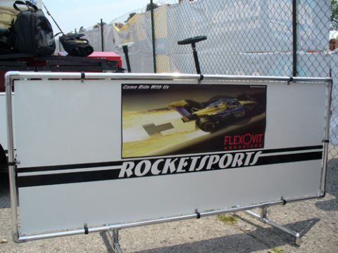 1995 Ford Taurus - A banner displays an advertisement for Flexovit Abrasives and Rocketsports, a race car.
