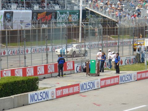 1995 Ford Taurus - Race car on track with Canadian and Molson branding visible on barriers.